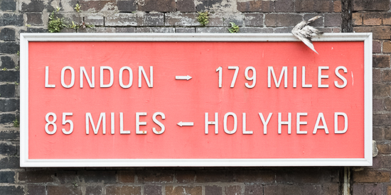 Sign showing distances to London and Holyhead at Chester, 25/6/14