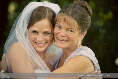 A portrait of the Mother of the bride with the bride.