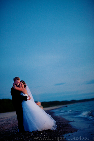 Wedding portraits on the beach at sunset in southwest michigan.