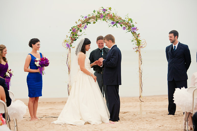 A beach wedding in the rain in South Haven Michigan.