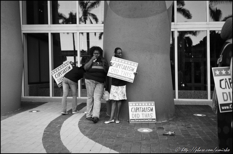 Street protesters at Biscayne boulevard in Miami, Florida, USA, 2009. Street Photography of Miami, San Francisco and Key West by Emir Shabashvili, see http://street-foto.com, http://miamistreetphoto.com, http://miamistreetphotography.com or http://miamistreetphotographer.com
